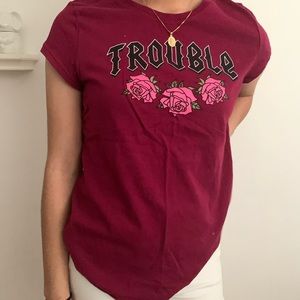 Magenta short sleeved “Trouble” graphic tee